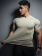 Nueva camiseta deportiva casual para hombre, de manga corta, elástica, de secado rápido y color sólido