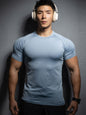Nueva camiseta deportiva casual para hombre, de manga corta, elástica, de secado rápido y color sólido