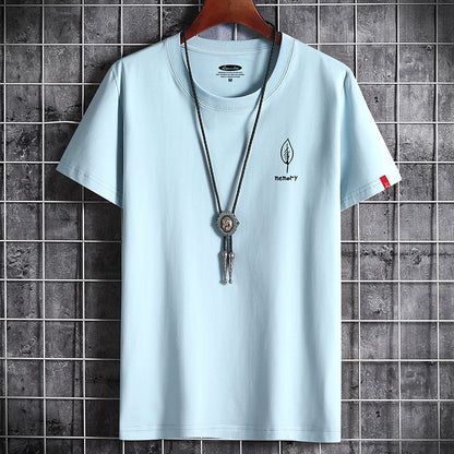 Camiseta de algodón oversize para hombre, manga corta, verano, estampado de hojas, estilo casual.