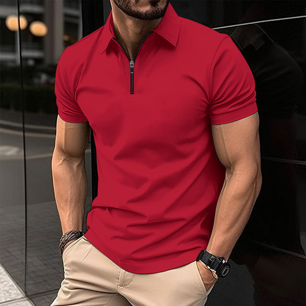Polo deportivo de color liso con cremallera para hombre.