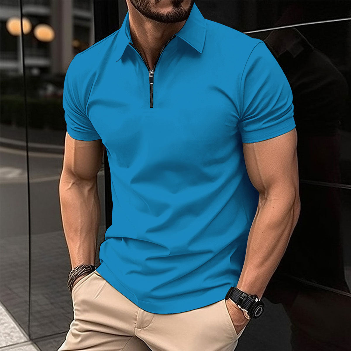Polo deportivo de color liso con cremallera para hombre.