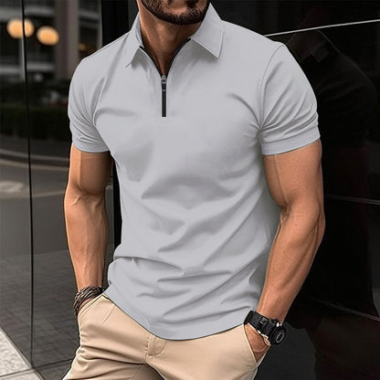 Polo deportivo de color liso con cremallera para hombre.