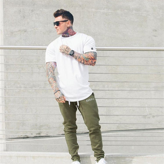 Muscle Master Herren-Rundhals-T-Shirt mit kurzen Ärmeln, zum Sport und Laufen, mit geschwungenem Saumdesign