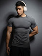 Nueva camiseta deportiva casual para hombre, de manga corta, elástica, de secado rápido y color sólido