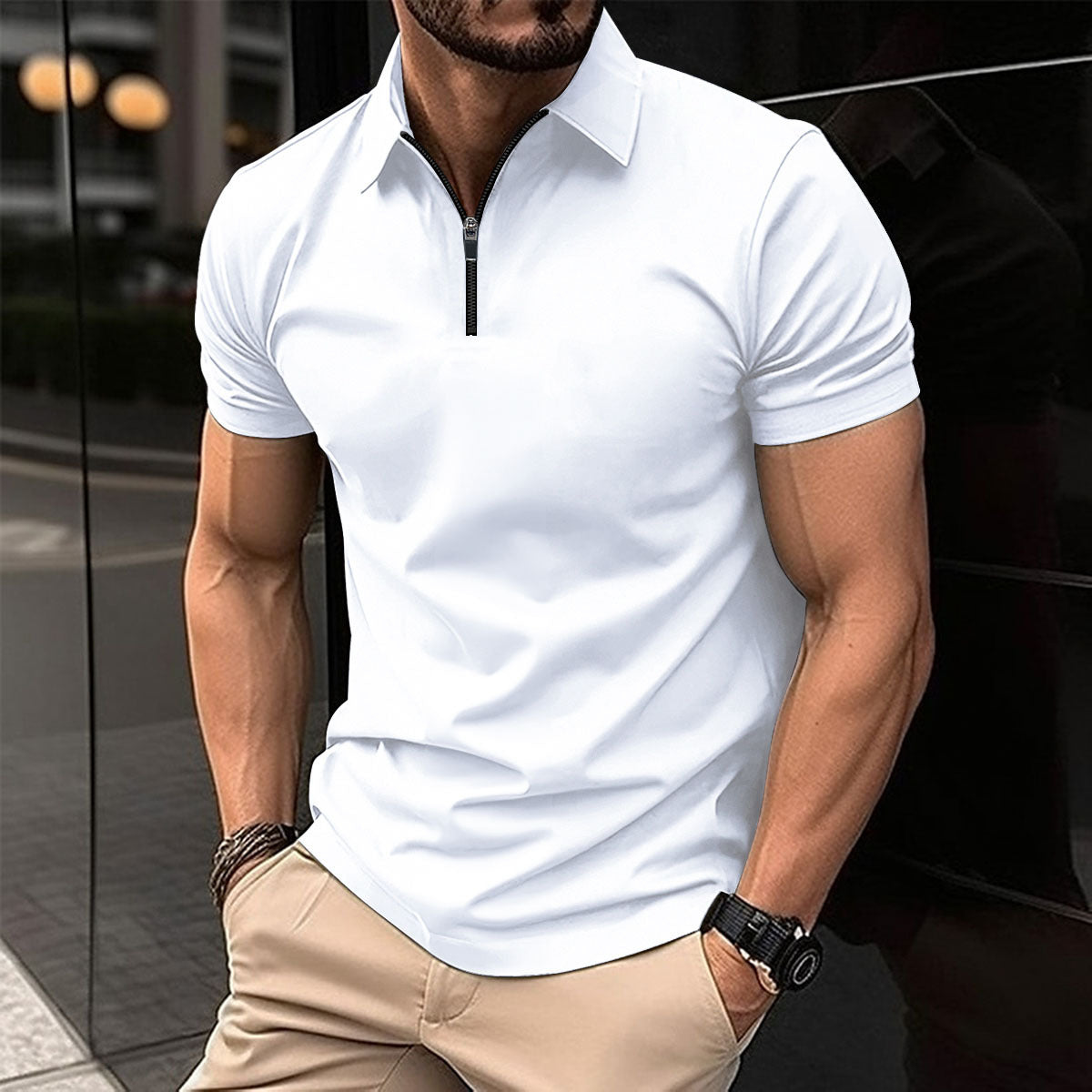 Polo deportivo de color liso con cremallera para hombre.