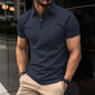 Polo deportivo de color liso con cremallera para hombre.