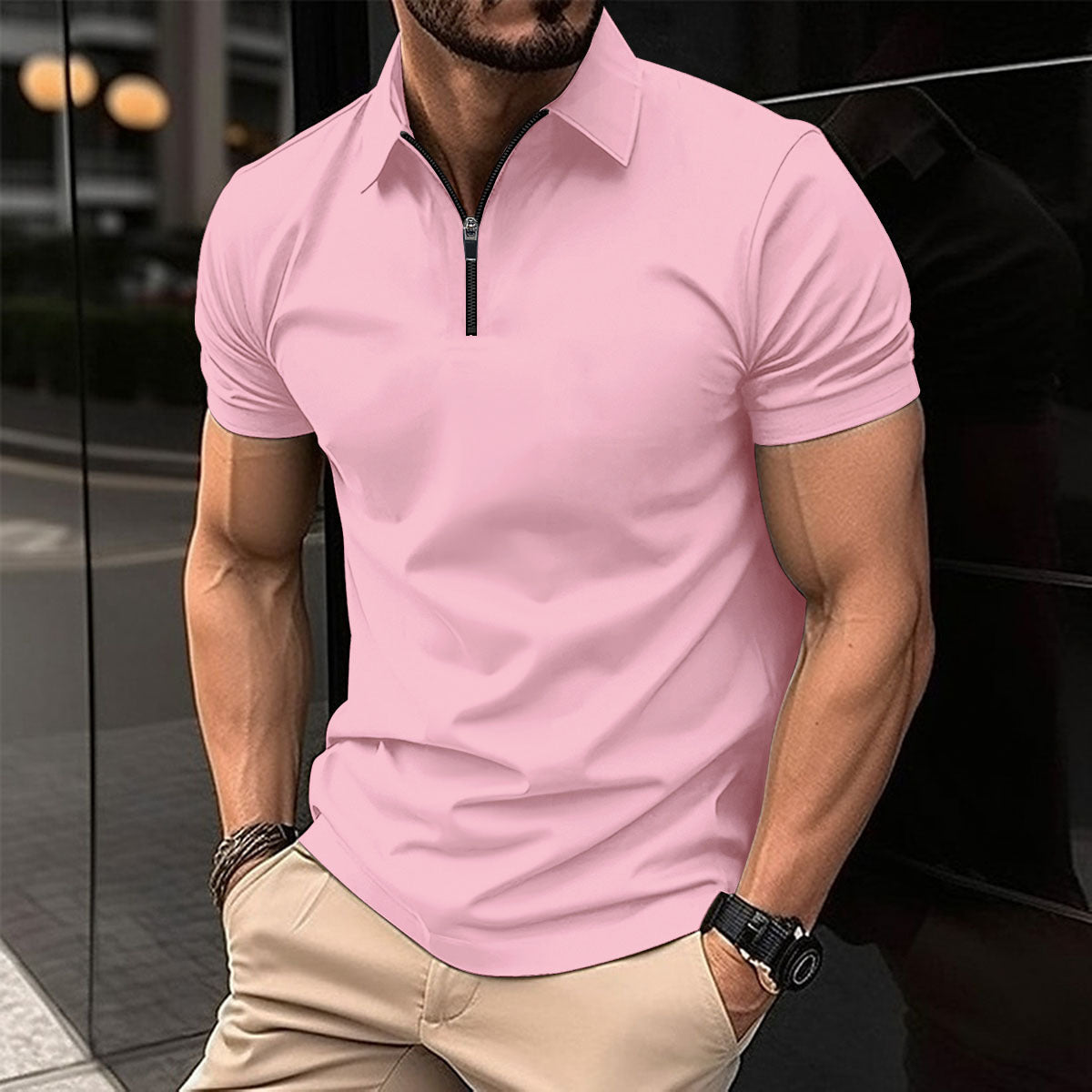 Polo deportivo de color liso con cremallera para hombre.