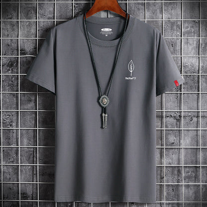 Camiseta de algodón oversize para hombre, manga corta, verano, estampado de hojas, estilo casual.