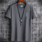 Camiseta de algodón oversize para hombre, manga corta, verano, estampado de hojas, estilo casual.